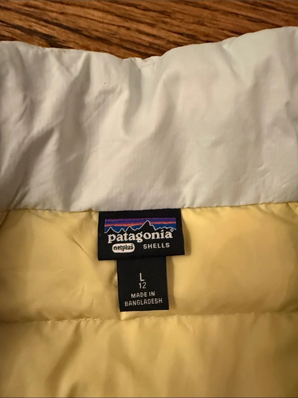 Patagonia Kids Light Gray Quilted Puffer Jacket, yellow inside.